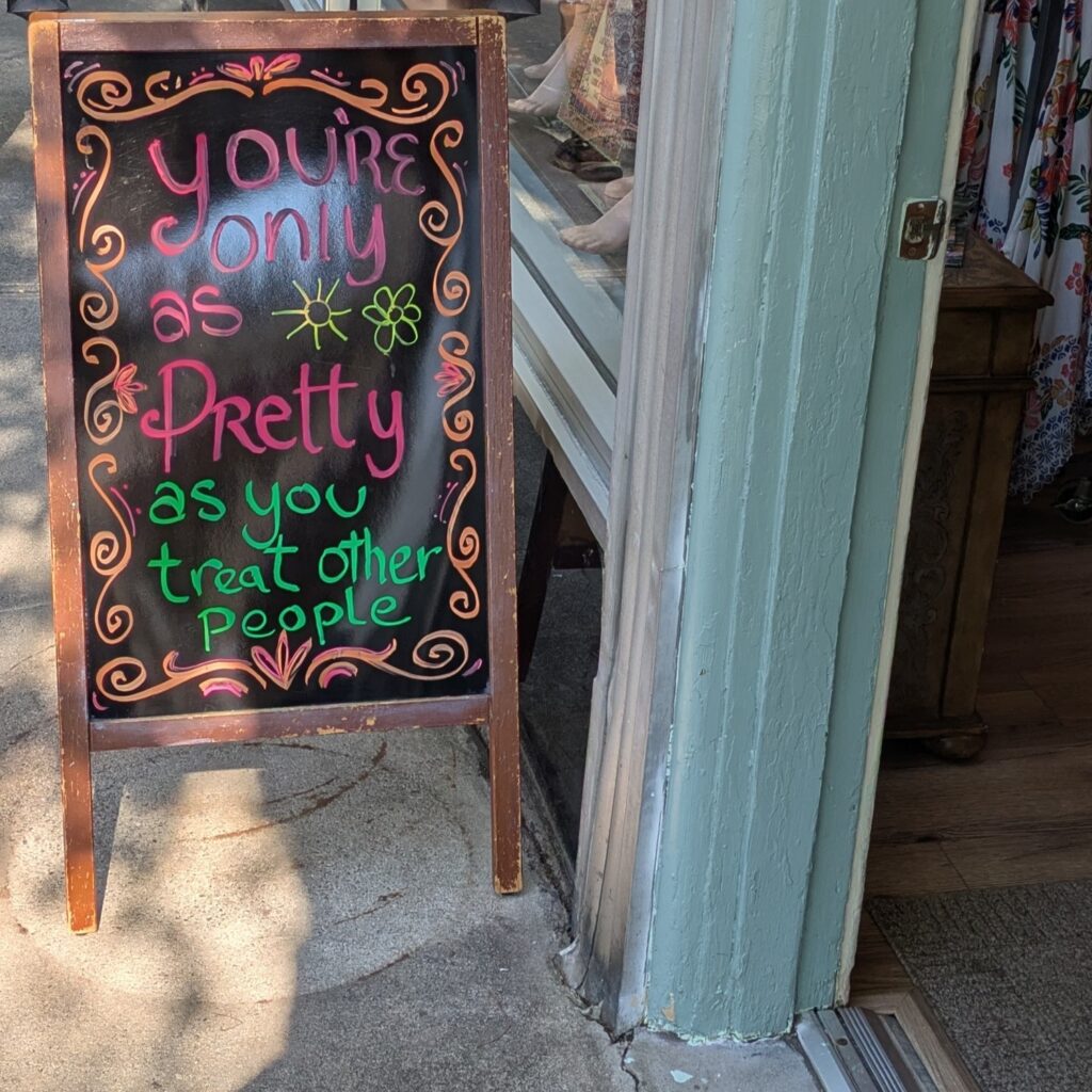 Sidewalk sign: You're only as pretty as you treat other people